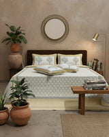 Jaali yellow lattice pure cotton bedsheet – styled on a bed