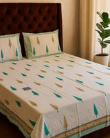 Kislaya olive leaf hand block pure cotton bedsheet – styled on a bed