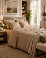 Kora - Solid Sateen Cotton Bedsheet | Beige bedsheet styled on the left side of the bed