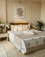 Pushpita brown floral pure cotton bedsheet – styled on a bed