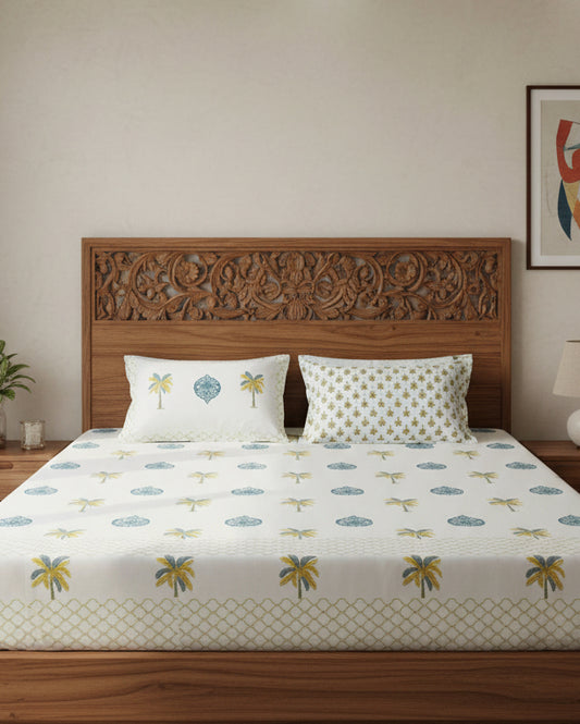 Sheet set with palm tree and leaf pattern on a white background
