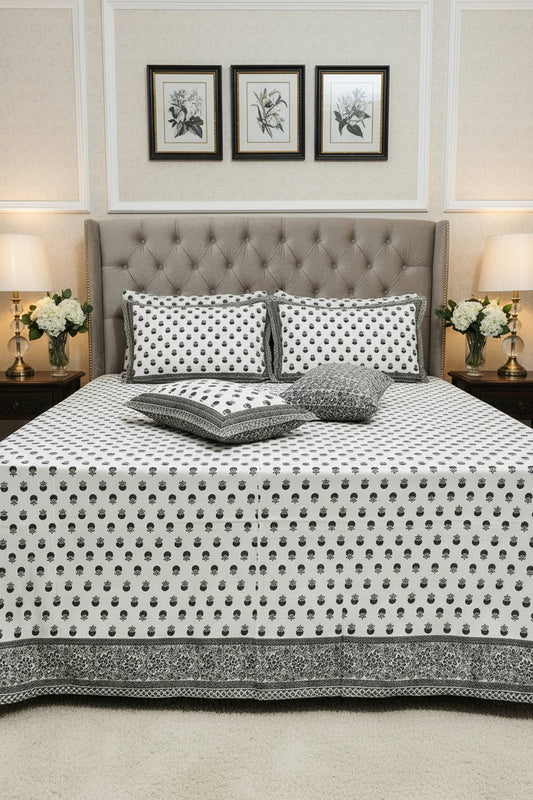 Charcoal grey floral booti cotton bedsheet on white with a deep grey border