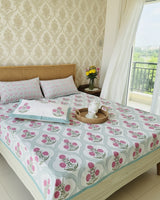 Surabhi blue floral pure cotton bedsheet – styled on a bed