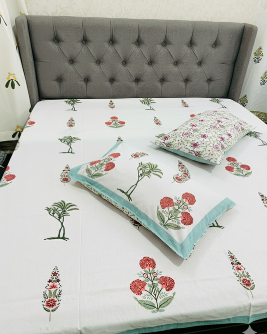 Coral floral and green palm motif soft fine cotton bedsheet with matching pillow covers