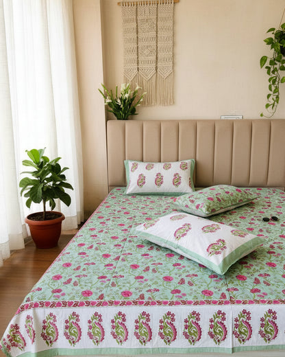 Anvita sage green cotton bedsheet with pink floral vines and paisley border pillow covers