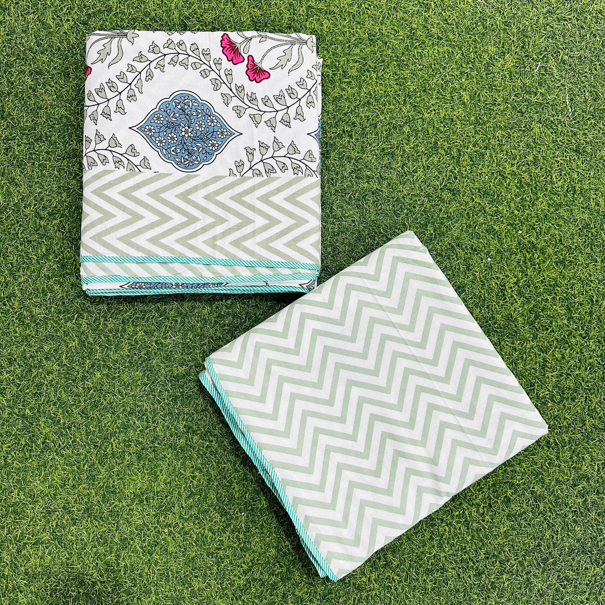Magenta and olive floral vine reversible mulmul cotton dohar with a sage chevron border and teal trim