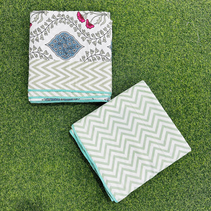 Magenta and olive floral vine reversible mulmul cotton dohar with a sage chevron border and teal trim