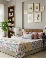 Bougainvillea pink floral pure cotton bedsheet – styled on a bed