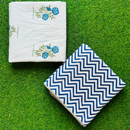Blue floral spray reversible mulmul cotton dohar with a navy chevron reverse