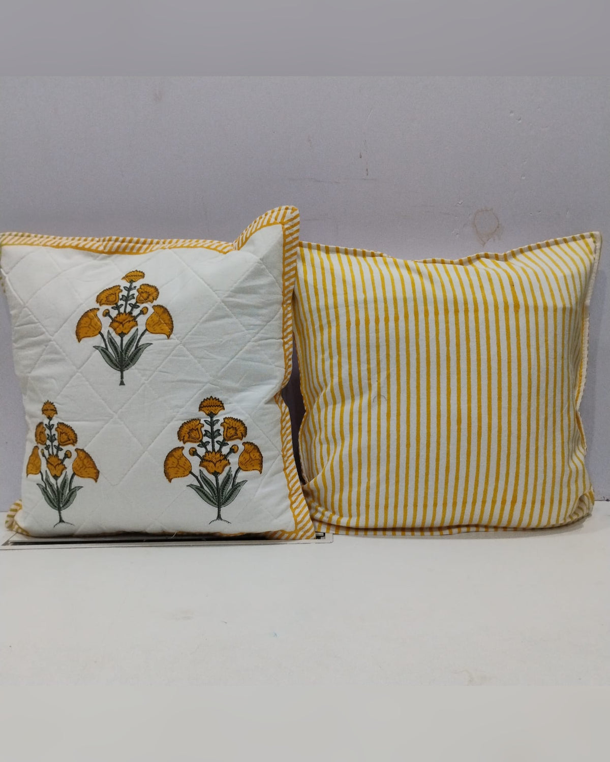 Guldasta yellow quilted cotton cushion cover – front view