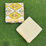 Bold yellow and sage floral bouquet reversible mulmul cotton dohar with a yellow chevron reverse