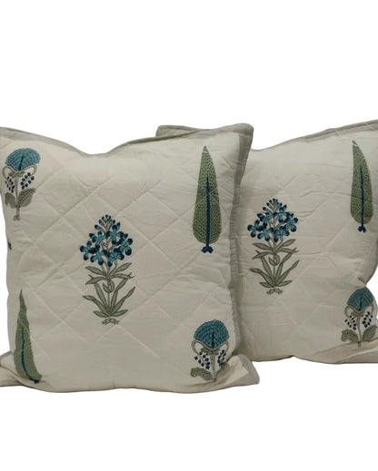 Pair of Gulmohar grey quilted cushion covers with blue floral and tree motifs