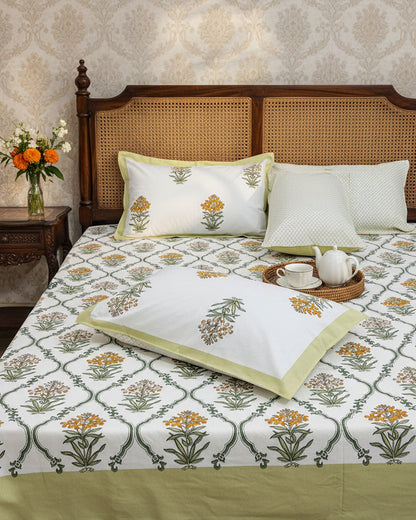 Indrani green floral pure cotton bedsheet – styled on a bed