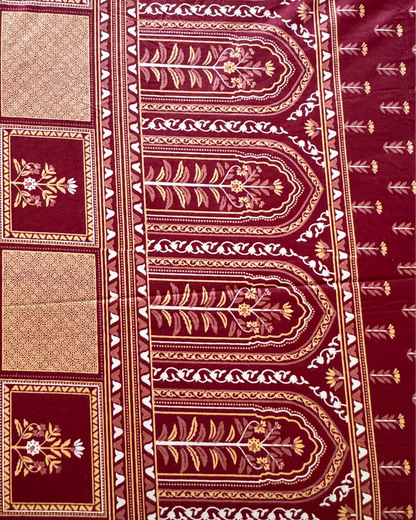 Close-up of the Tarang Red arched border print