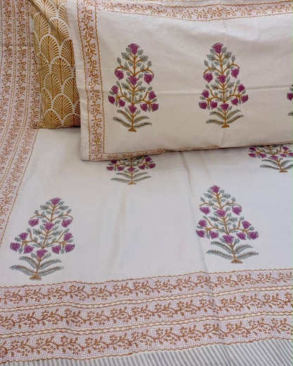 Kadambika hand block Percale Cotton bedsheet with plum and mauve floral buta on ivory and a rust-orange border