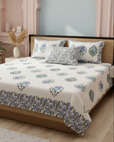 Kamini blue floral pure cotton bedsheet – styled on a bed