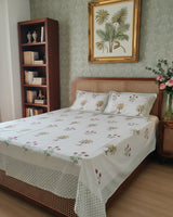 Ketaki olive floral pure cotton bedsheet – styled on a bed