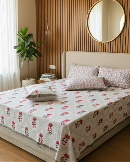 Komal grey floral pure cotton bedsheet – styled on a bed