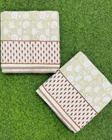 Beige floral reversible mulmul cotton dohar with a red teardrop border