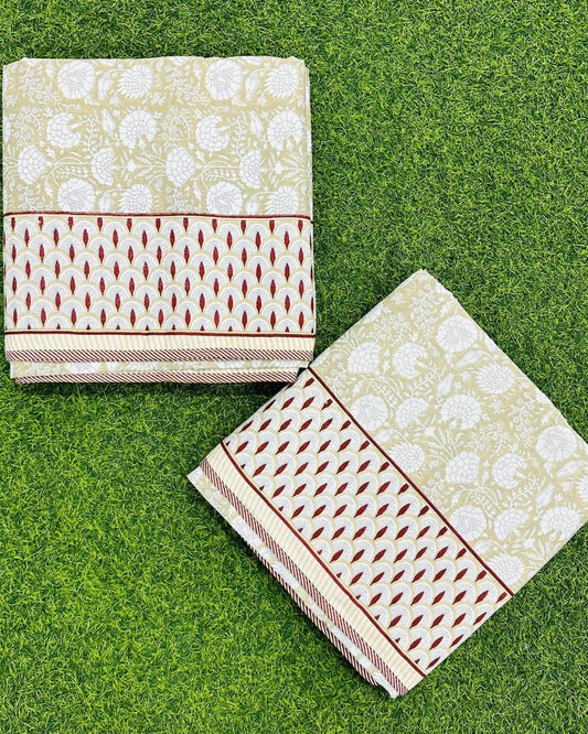 Beige floral reversible mulmul cotton dohar with a red teardrop border
