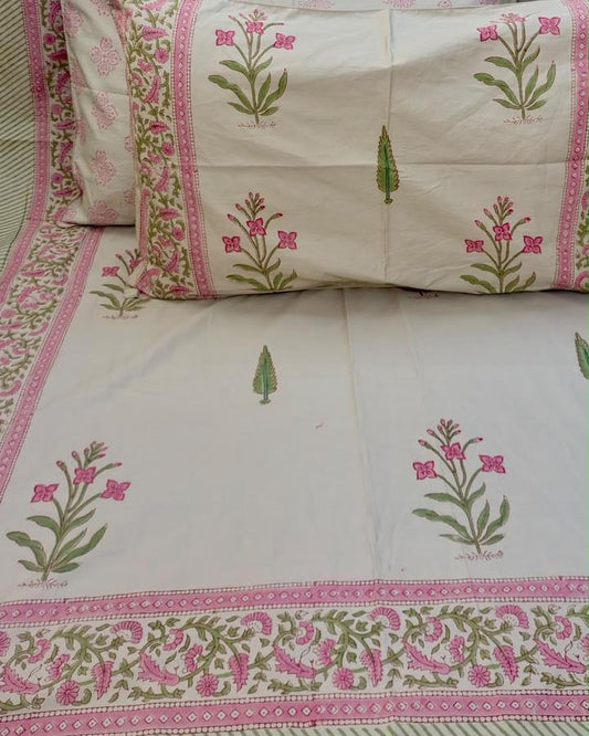 Malika hand block Percale Cotton bedsheet with pink flowers on green stems on ivory and a pink floral border