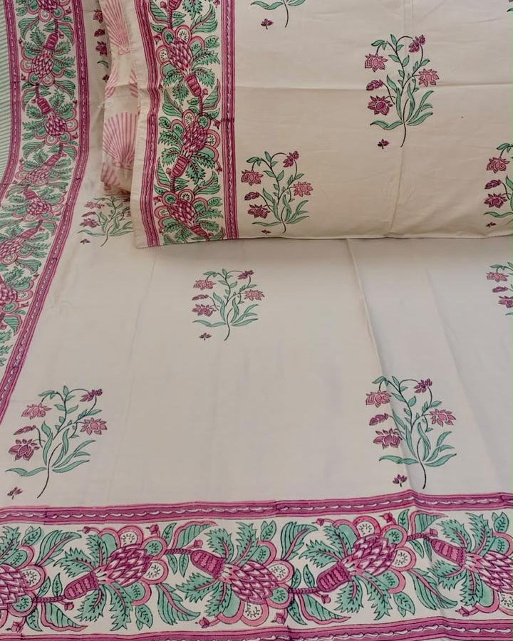 Malti hand block Percale Cotton bedsheet with pink and green floral buta and a wide pink-and-green border