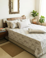 Mehek grey floral pure cotton bedsheet – styled on a bed