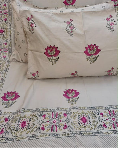 Nalini hand block Percale Cotton bedsheet with magenta lotus buta on ivory and a magenta and green border