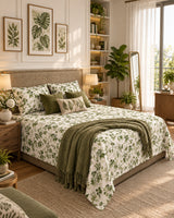 Pallav Green Everyday Cotton bedsheet with olive-green florals on white, styled with an olive throw