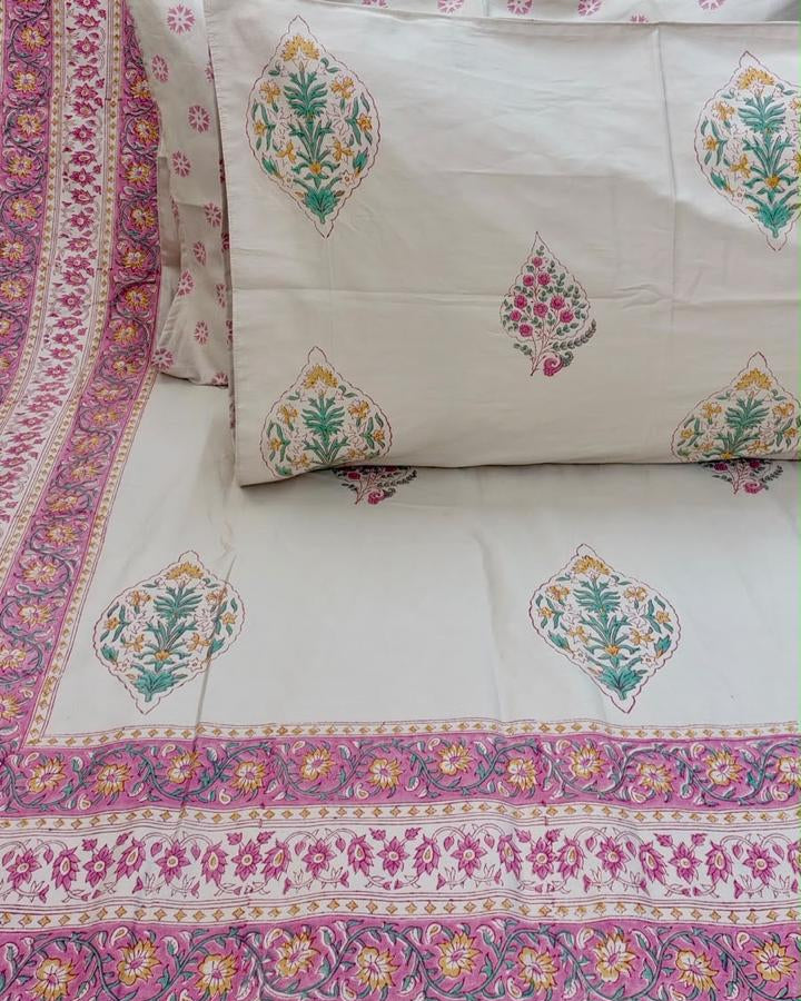 Pankhuri hand block Percale Cotton bedsheet with pink, orange and teal paisley buta on ivory and a pink border