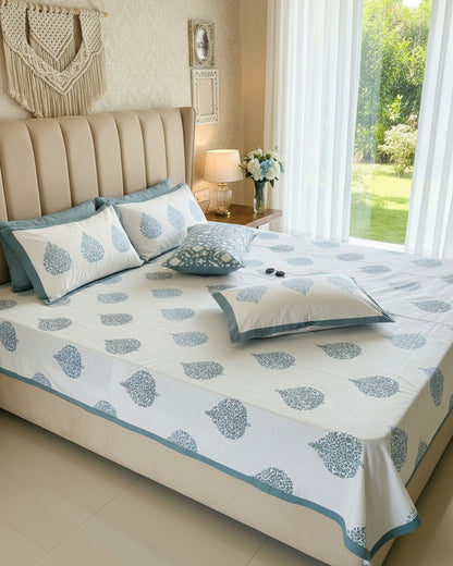 Patralekha blue leaf pure cotton bedsheet – styled on a bed