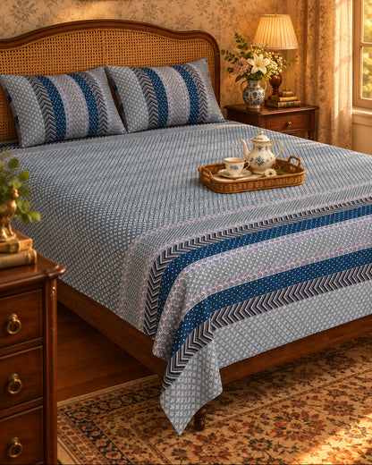 Preet Light Blue striped bedsheet and pillow covers with a tea tray on a wooden bed