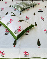 Pushpita Green Everyday Cotton bedsheet – close-up of orchid florals, green motifs and pillow cover