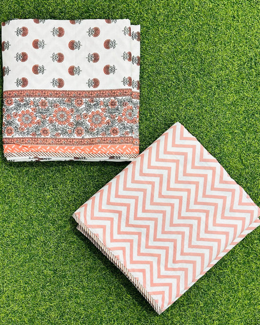 Orange floral cluster reversible mulmul cotton dohar with grey-green accents and an orange chevron reverse