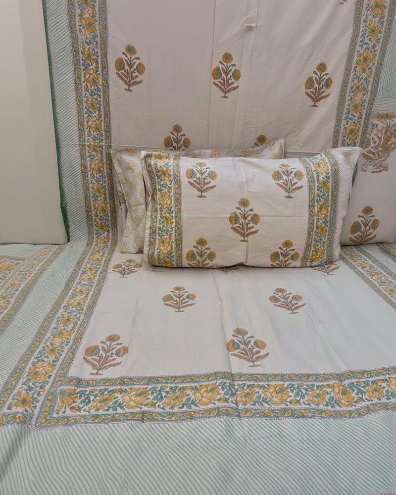 Sonali hand block Percale Cotton bedsheet with mustard and sage floral buta on ivory and a green and yellow border