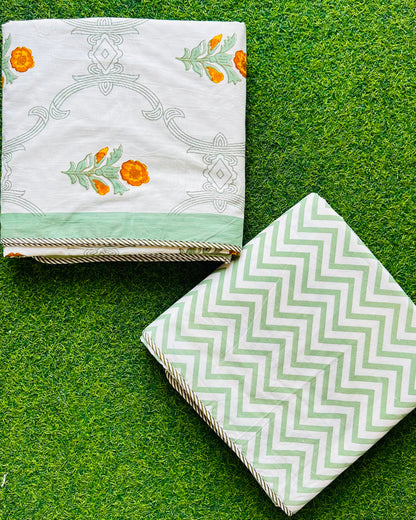 Sage medallion trellis reversible mulmul cotton dohar with marigold orange florets and a sage chevron reverse