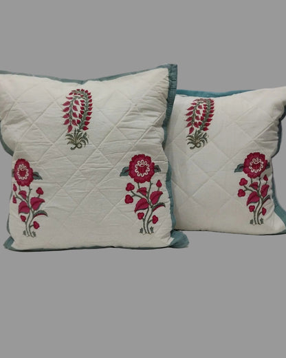 Pair of Surmayi blue quilted cushion covers with pink floral and paisley motifs