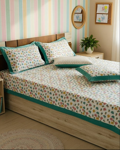 Hand block butterfly print kids cotton bedsheet in pink yellow and teal with a teal border