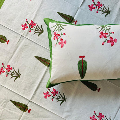 Pushpita green border detail on the pink orchid pure cotton bedsheet