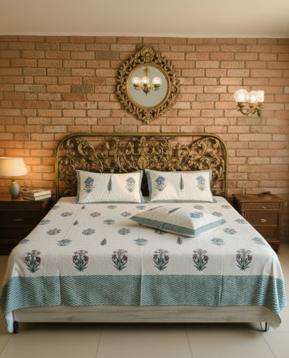 Vasantika green floral pure cotton bedsheet – styled on a bed